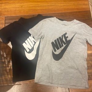 Great condition Nike cotton tees. Size 7, but run a little small.